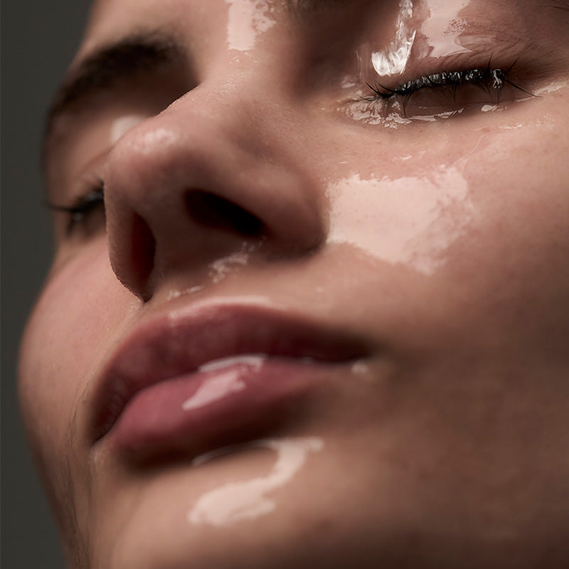 Wet face of a woman close up